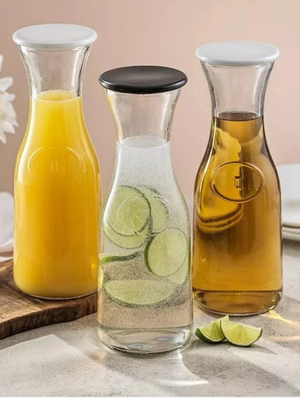 Joyjolt Hali Glass Carafe Bottle Pitcher with 6 Lids - 36 Oz - Set of 3